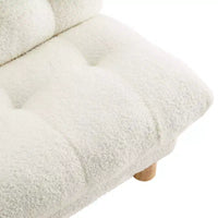 Canapé pour enfants rembourré en fausse fourrure d'agneau Buzz & Bloom avec assise et dossier capitonnés, pieds en bois, coloris marshmallow