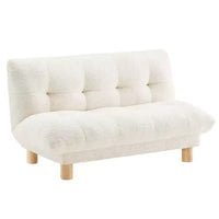 Canapé pour enfants rembourré en fausse fourrure d'agneau Buzz & Bloom avec assise et dossier capitonnés, pieds en bois, coloris marshmallow