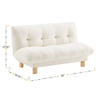 Canapé pour enfants rembourré en fausse fourrure d'agneau Buzz & Bloom avec assise et dossier capitonnés, pieds en bois, coloris marshmallow