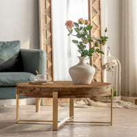 Table basse ronde rétro moderne à assemblage avec plateau en bois de sapin pied croisé doré, pour salon