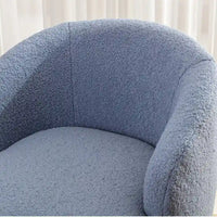 Fauteuil d'appoint tonneau pivotant en tissu Teddy avec anneau métallique thermolaqué