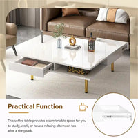 Table basse laquée : 4 pieds dorés, 2 tiroirs, design carré à 2 niveaux